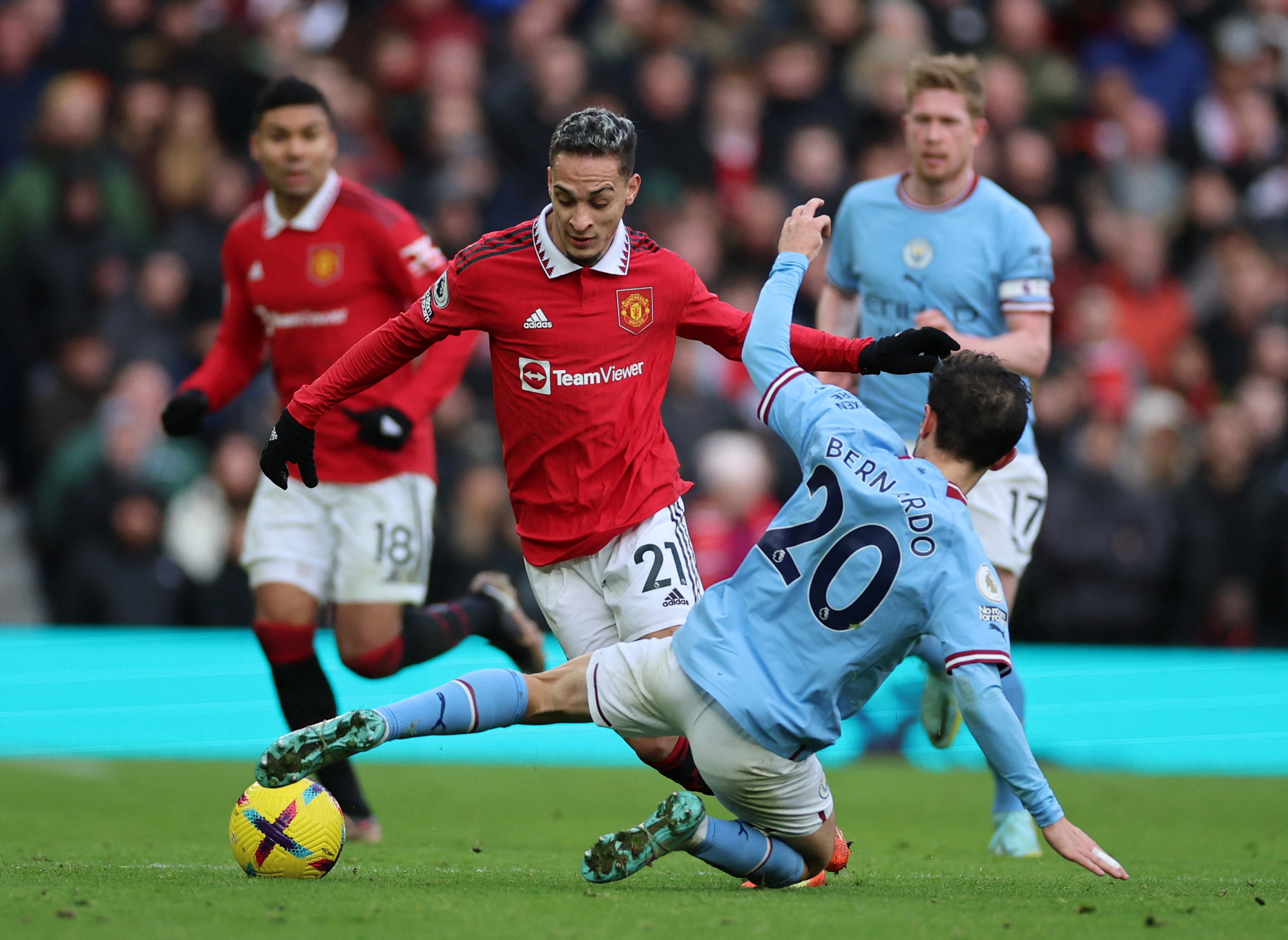 Antony in action with Manchester City's Bernardo Silva. Image credit: REUTERS/Phil Noble Image