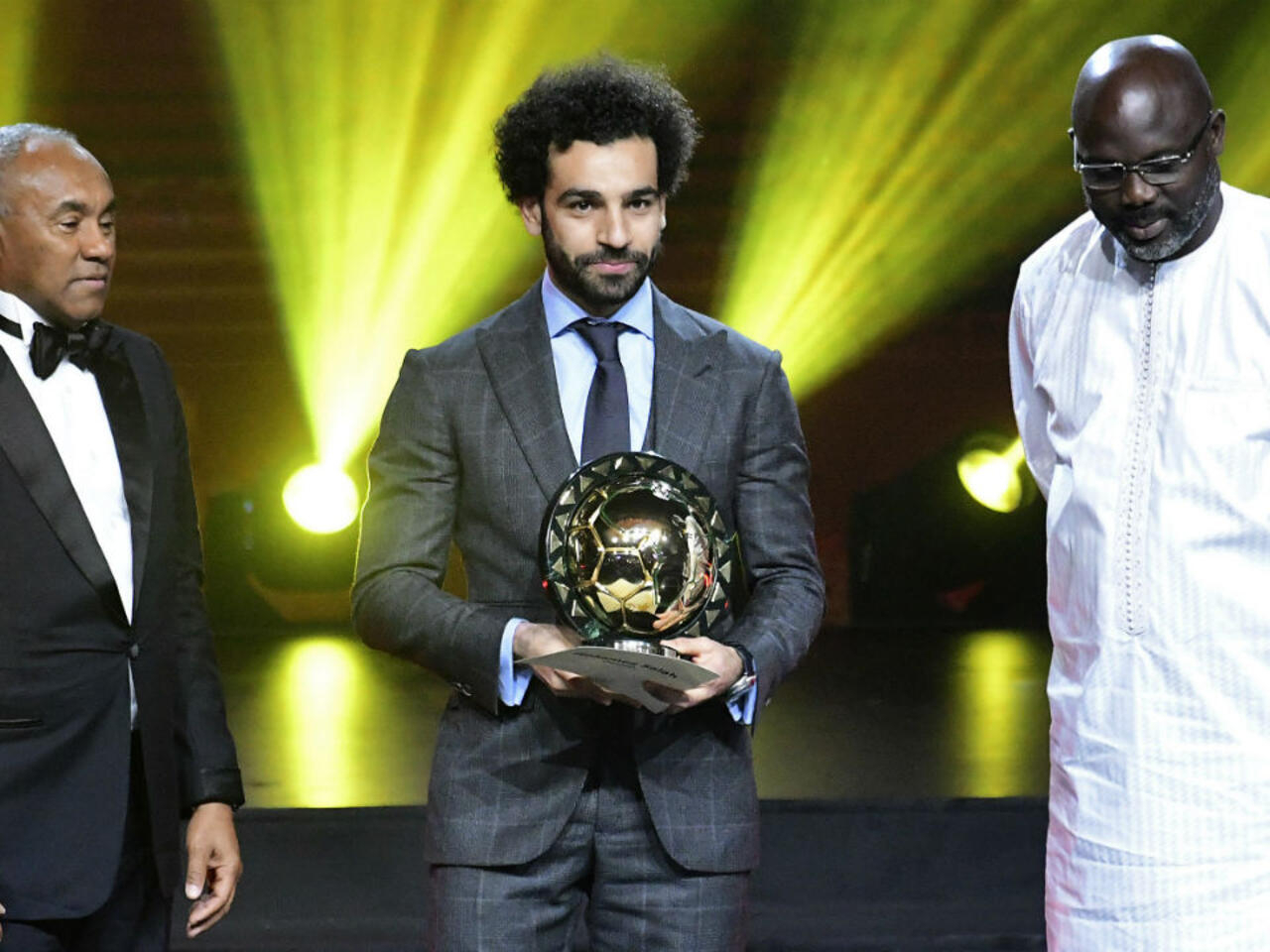 Mohammed Salah receiving an Award. Image Credit: Seyllou, AFP Mohammed Salah