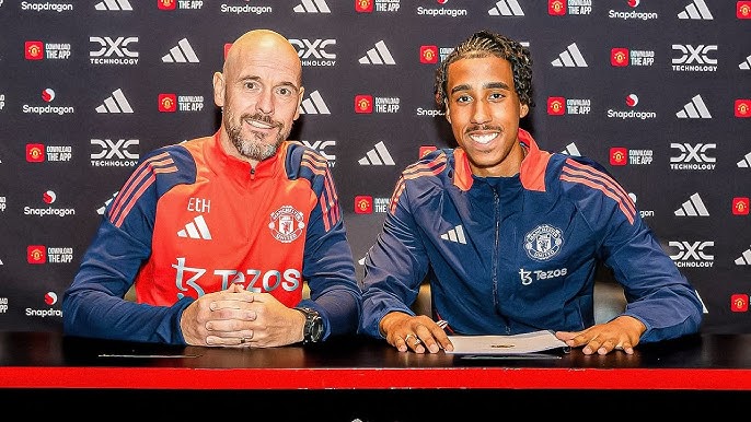 Leny Yoro (Right) with Erik Ten Hag (Left). Image Credit: Manchester United Image
